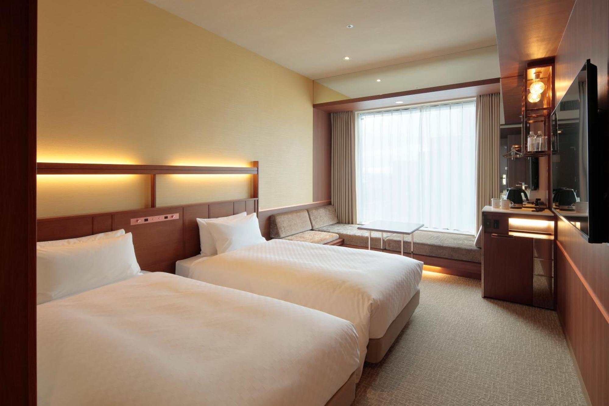 Candeo Shinsaibashi ホテル 4*